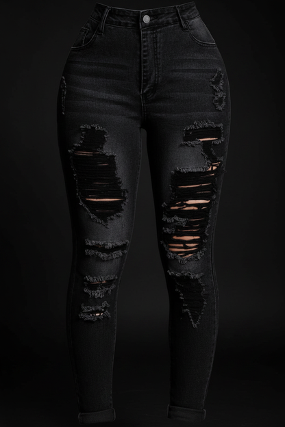 Black ripped skinny jeans front view on mannequin black studio